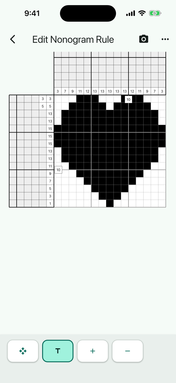 Clue editor showing an auto-solve result on the board: a heart